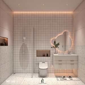 Phòng vệ sinh hiện đại trong nhà ở kết hợp với kinh doanh Thanh Hiền Smartphone, với gạch ốp terrazzo, bồn rửa mặt tinh gọn và vách kính tắm.
